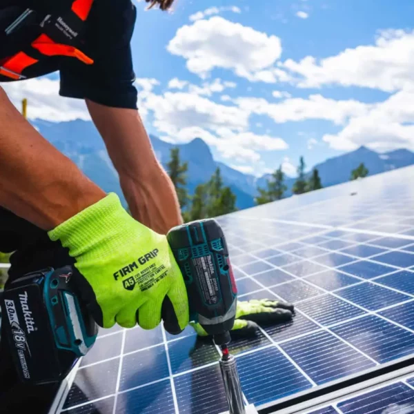 worker installing solar panel roof Zeno